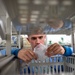 USNS Mercy Sailor Takes Inventory of the Medical Supplies