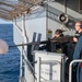 USS America (LHA 6) conducts a live fire exercise