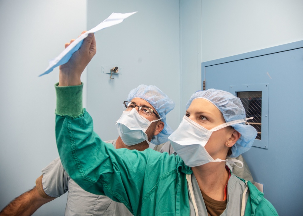 Nurses Inspect Filter Prior to Surgery Aboard USNS Mercy (T-AH 19)