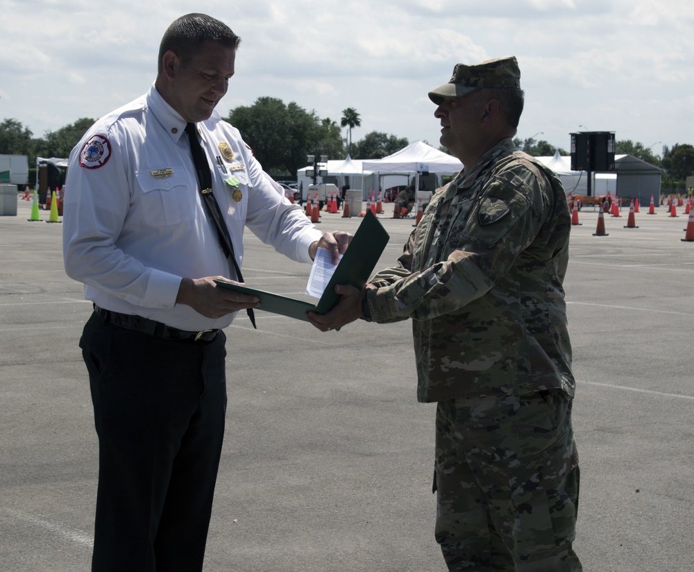 Colonel awards Florida Commendation Medal Hard Rock Stadium CBTS