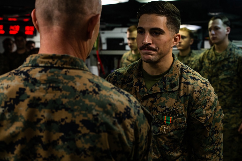 31st MEU Marines awarded by MEU commander aboard USS America