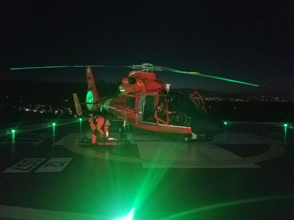 Coast Guard MH-65 Dolphin crew prepares to conduct medevac