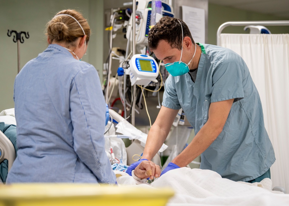 USNS Mercy Sailor Treats Patient