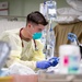 USNS Mercy Sailor Treats Patient