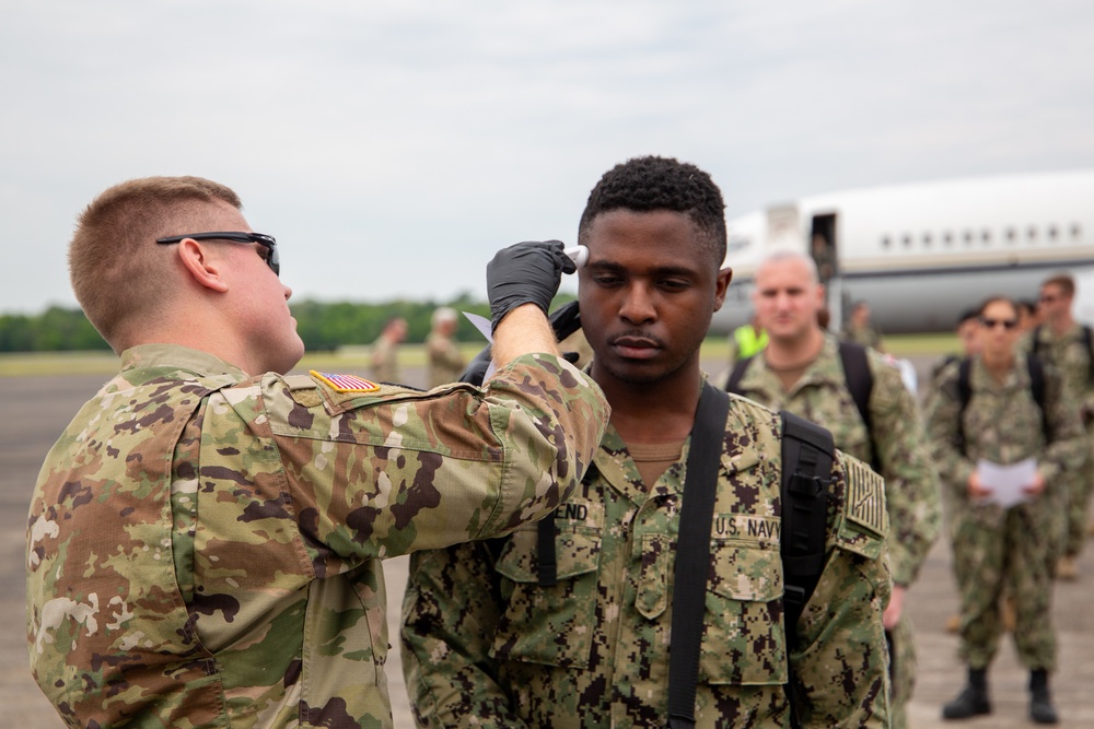 U.S. Army Soldiers screen Sailors