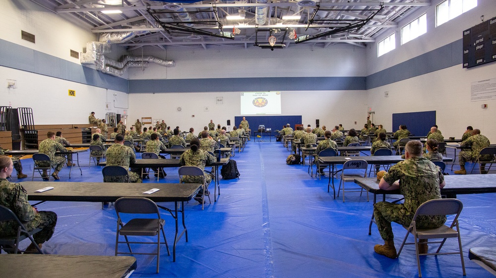 U.S. Navy Sailors attend JRSOI brief