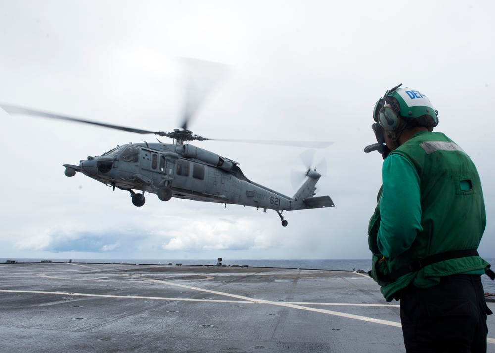 Commander, U.S. 7th Fleet, Vice Adm. Bill Merz departs USS Blue Ridge (LCC 19) heading to Guam to assess and support the ongoing recovery efforts of the crew of USS Theodore Roosevelt (CVN 71).