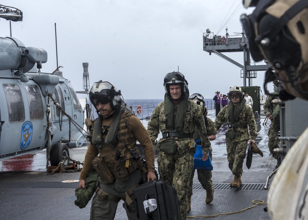 Commander, U.S. 7th Fleet, Vice Adm. Bill Merz prepares to depart USS Blue Ridge (LCC 19) heading to Guam to assess and support the ongoing recovery efforts of the crew of USS Theodore Roosevelt (CVN 71).