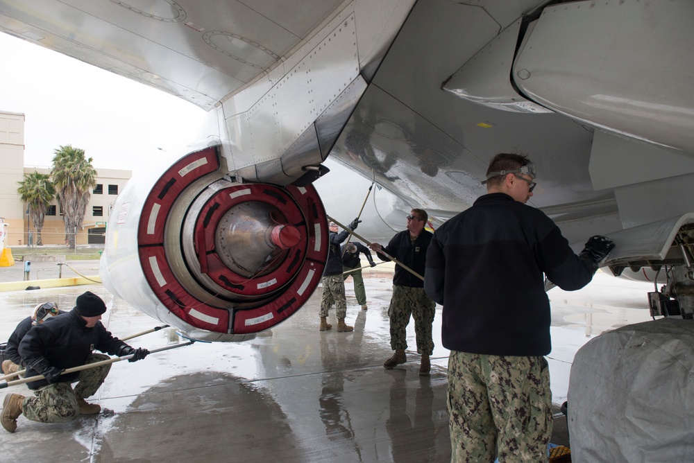 VP-4 Sailors Execute Plane Wash