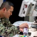 USNS Mercy Sailor Prepares FRV Name Patch