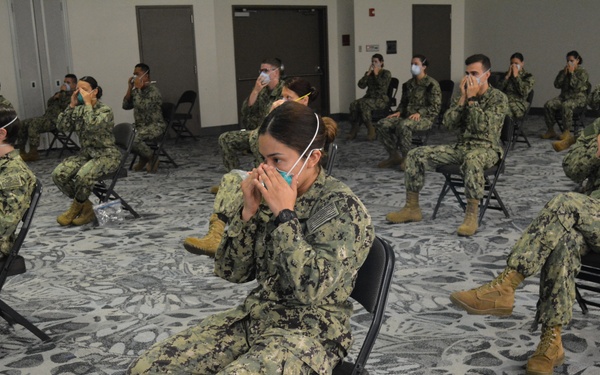 Expeditionary Medical Facility - M Personnel Conduct Personal Protective Equipment Training in Dallas