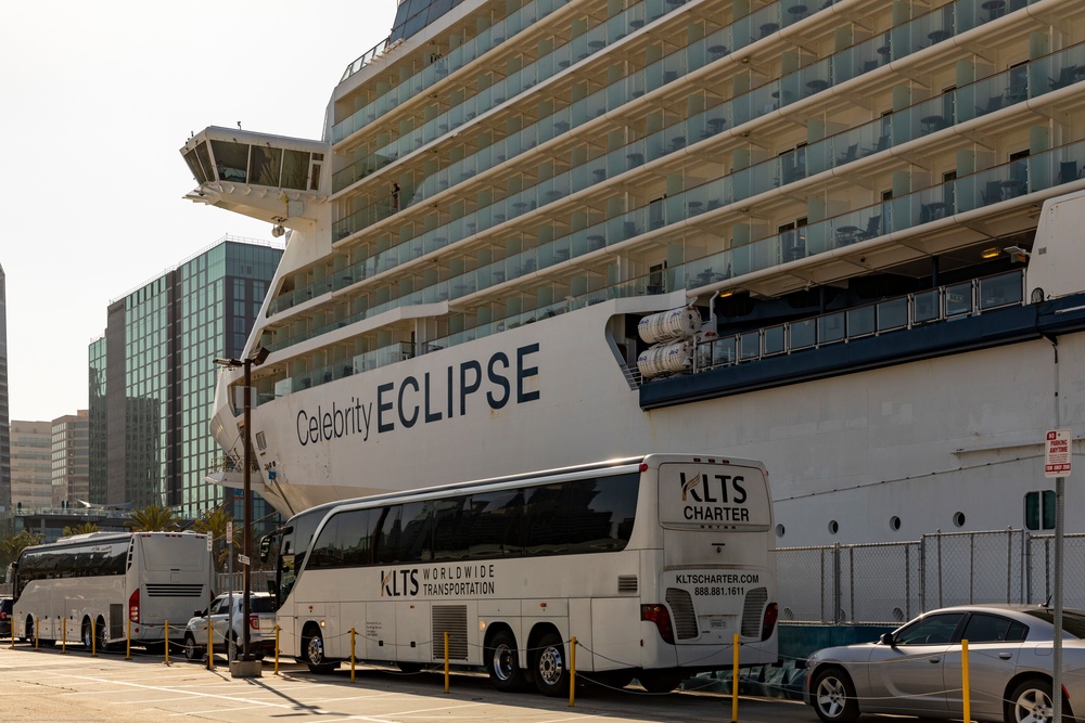 Celebrity Eclipse passengers disembark in San Diego to a jet waiting to take them to their home countries