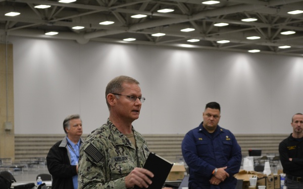EMF Sailors Briefs FEMA and DHHS Officials During a Rehearsal of Concept for Patient Care