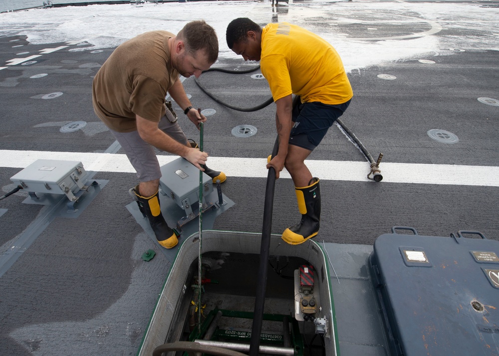 USS Gabrielle Giffords Flight Deck Washdown