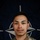 NATO BG-P Soldiers test on EIB and ESB tasks A U.S. Army soldier poses for an official portrait in front of a NATO flag. The soldier is wearing MultiCam (OCP) camouflage uniform with visible U.S. Army tape and a name tape reading 'PAVONI'. The image is part of a NATO eFP (enhanced Forward Presence) Battle Group promotional campaign.