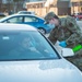 Connecticut Guardsmen screen personnel entering Bradley Air National Guard Base