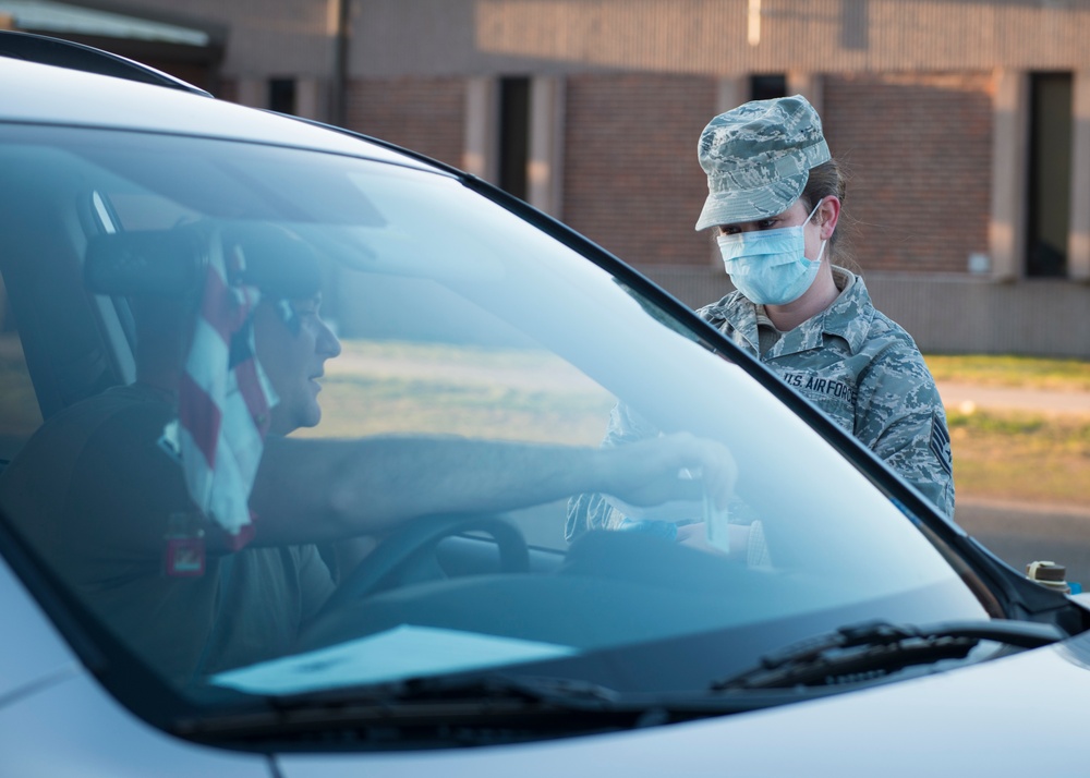 Connecticut Guardsmen screen personnel entering Bradley Air National Guard Base