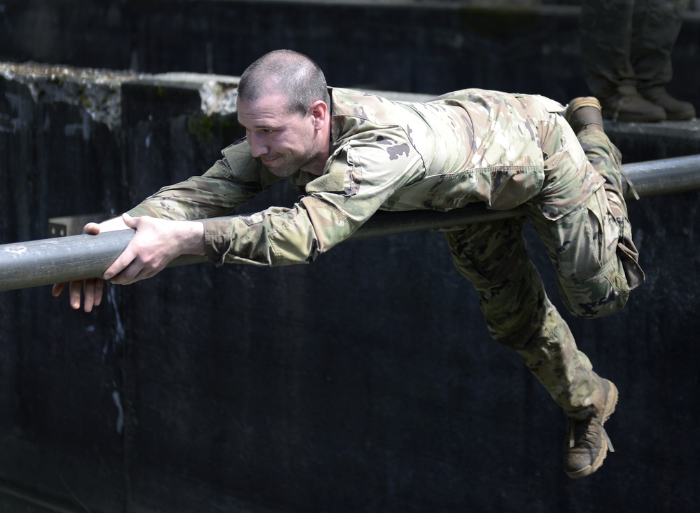 SWCS Students Climb, Scale, Rapel, Traverse Barriers During SERE Course