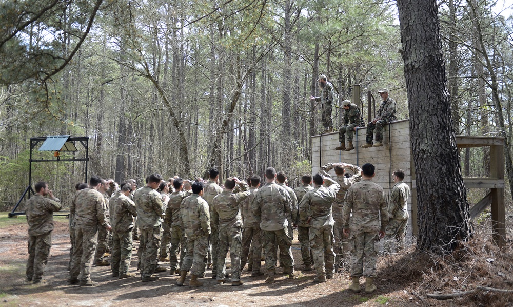 SWCS Students Climb, Scale, Rapel, Traverse Barriers During SERE Course