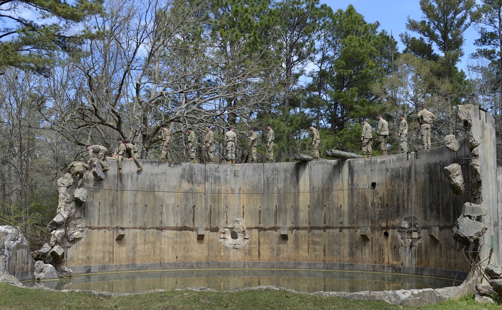 SWCS Students Climb, Scale, Rapel, Traverse Barriers During SERE Course