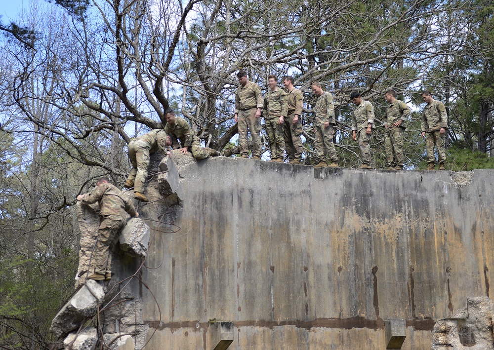 SWCS Students Climb, Scale, Rapel, Traverse Barriers During SERE Course