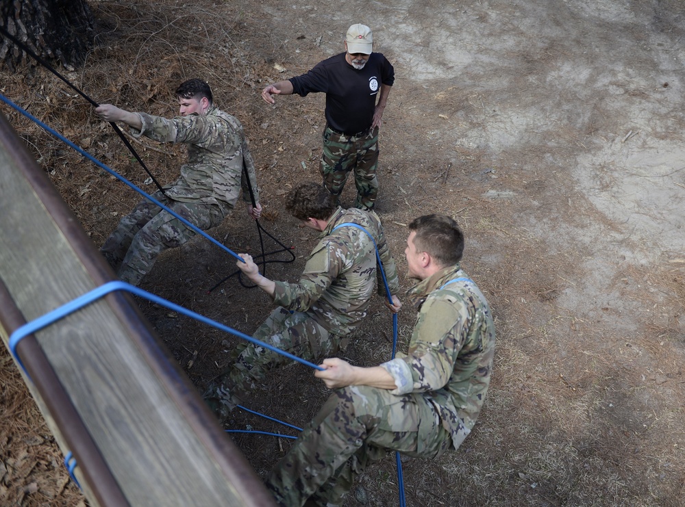 SWCS Students Climb, Scale, Rapel, Traverse Barriers During SERE Course