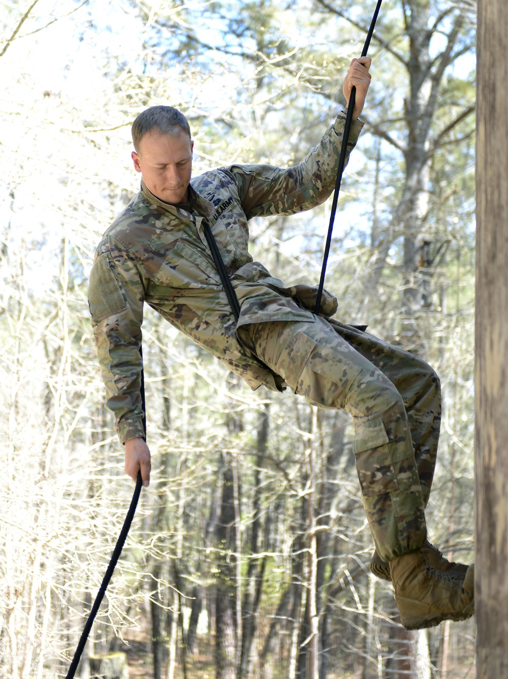 SWCS Students Climb, Scale, Rapel, Traverse Barriers During SERE Course