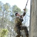 SWCS Students Climb, Scale, Rapel, Traverse Barriers During SERE Course