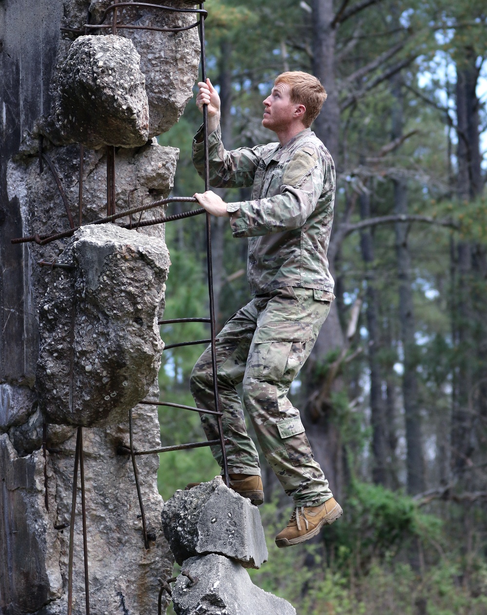 SWCS Students Climb, Scale, Rapel, Traverse Barriers During SERE Course