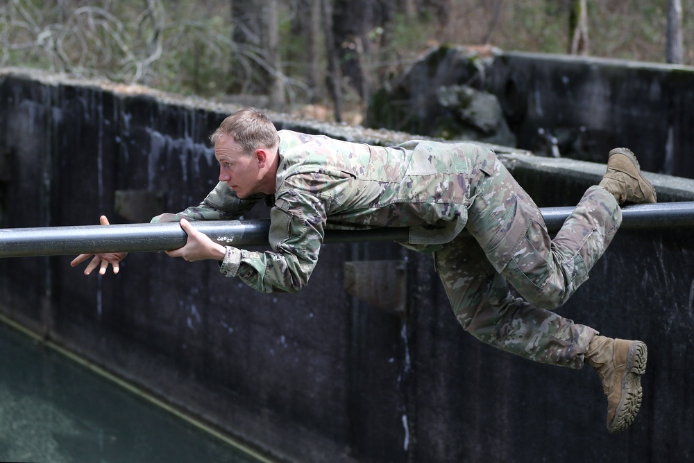 SWCS Students Climb, Scale, Rapel, Traverse Barriers During SERE Course