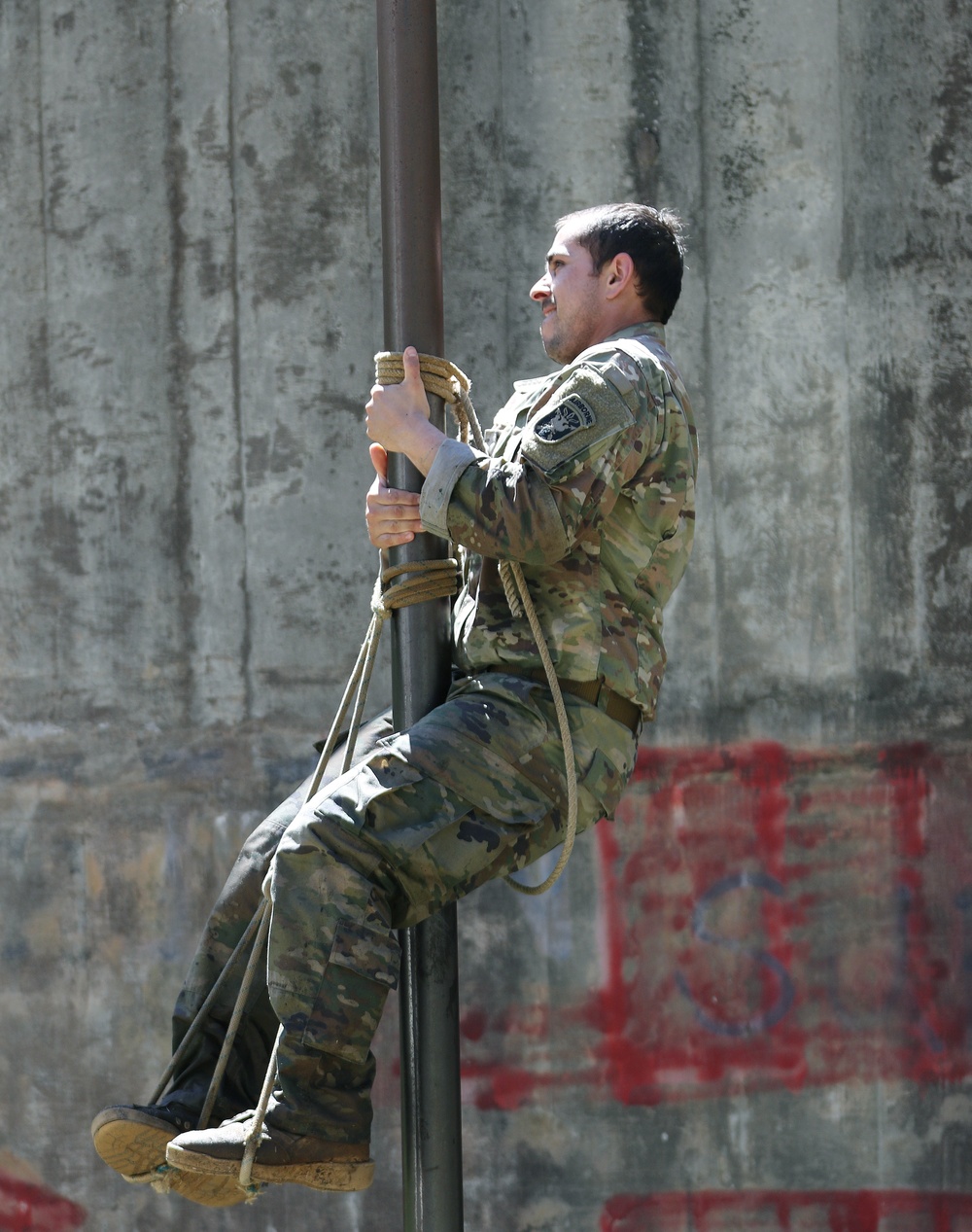 SWCS Students Climb, Scale, Rapel, Traverse Barriers During SERE Course