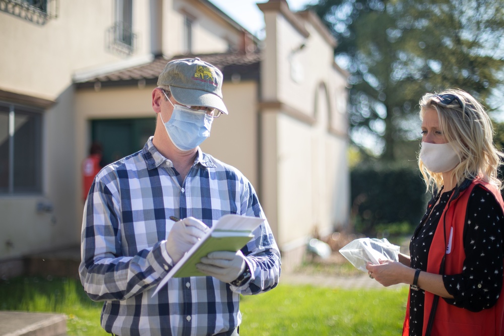 U.S. Army Garrison Italy Soldiers and American Red Cross deliver face masks in Villaggio Housing