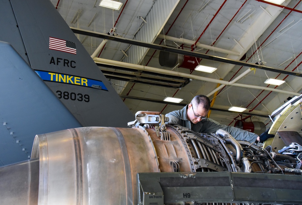 Maintainers perform engine swap