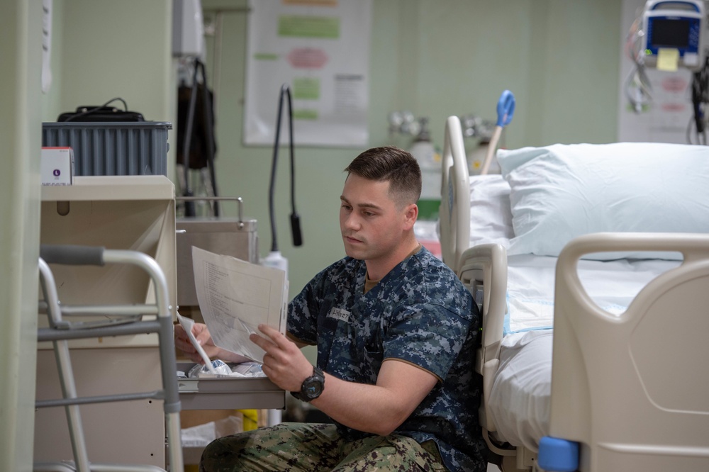 Sailors Prepare Medical Equipment aboard USNS Mercy (T-AH 19)