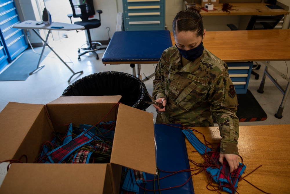 Airmen, volunteers of AAFB unite to create masks to fight COVID-19