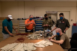 Airmen, volunteers of AAFB unite to create masks to fight COVID-19