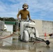 U.S. Navy Seabees with NMCB-5’s Detail Sasebo work on two pre-engineered buildings for NBU-7