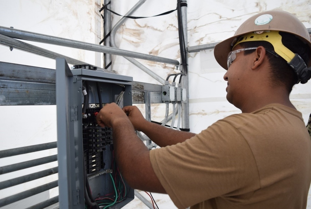 U.S. Navy Seabees with NMCB-5's Detail Diego Garcia support the U.S. Air Force