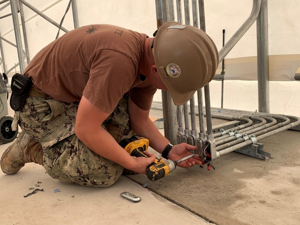 U.S. Navy Seabees with NMCB-5's Detail Diego Garcia support the U.S. Air Force