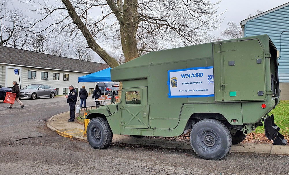 Excess Guard trucks deliver meals