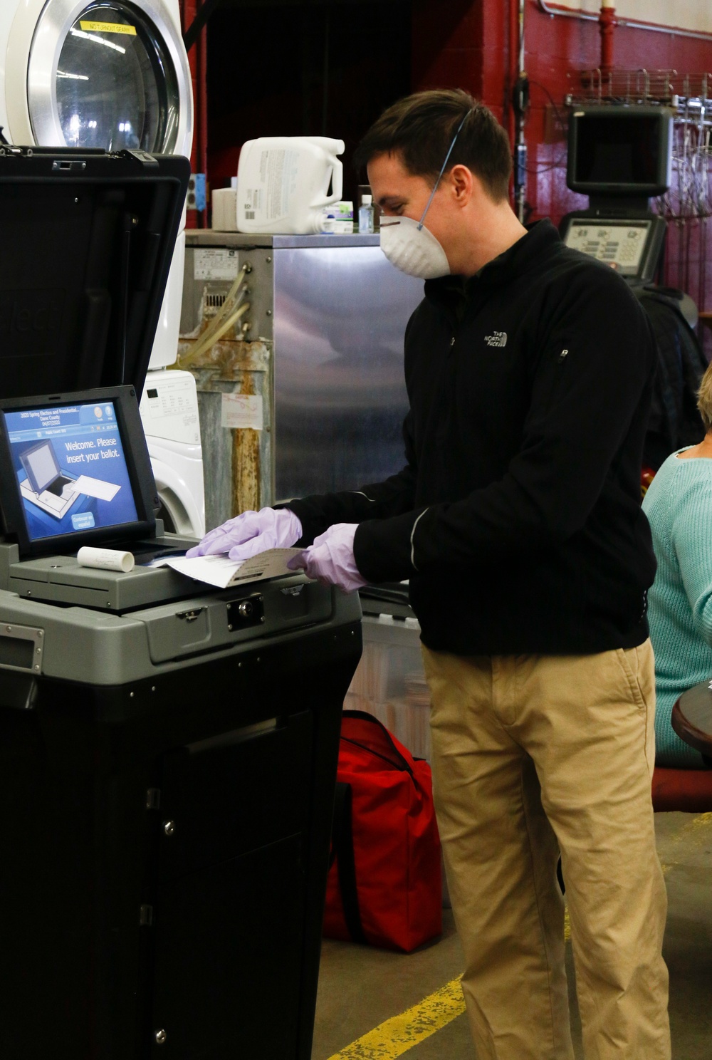 In a first for Wisconsin National Guard, Citizen Soldiers and Airmen serve as poll workers across Wisconsin on election day