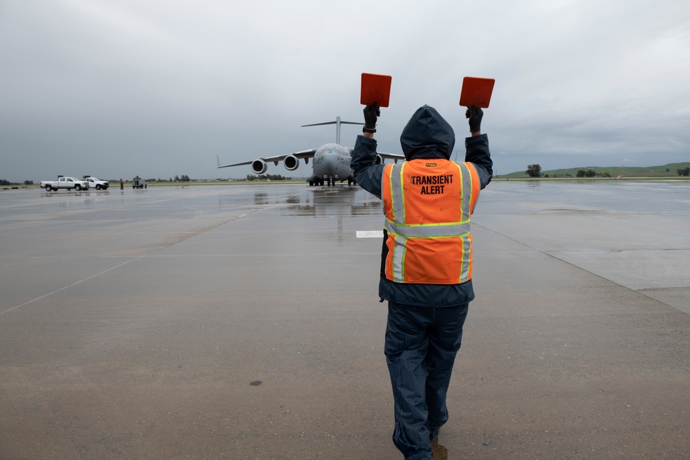 Mobility Airmen deliver aid to combat COVID-19