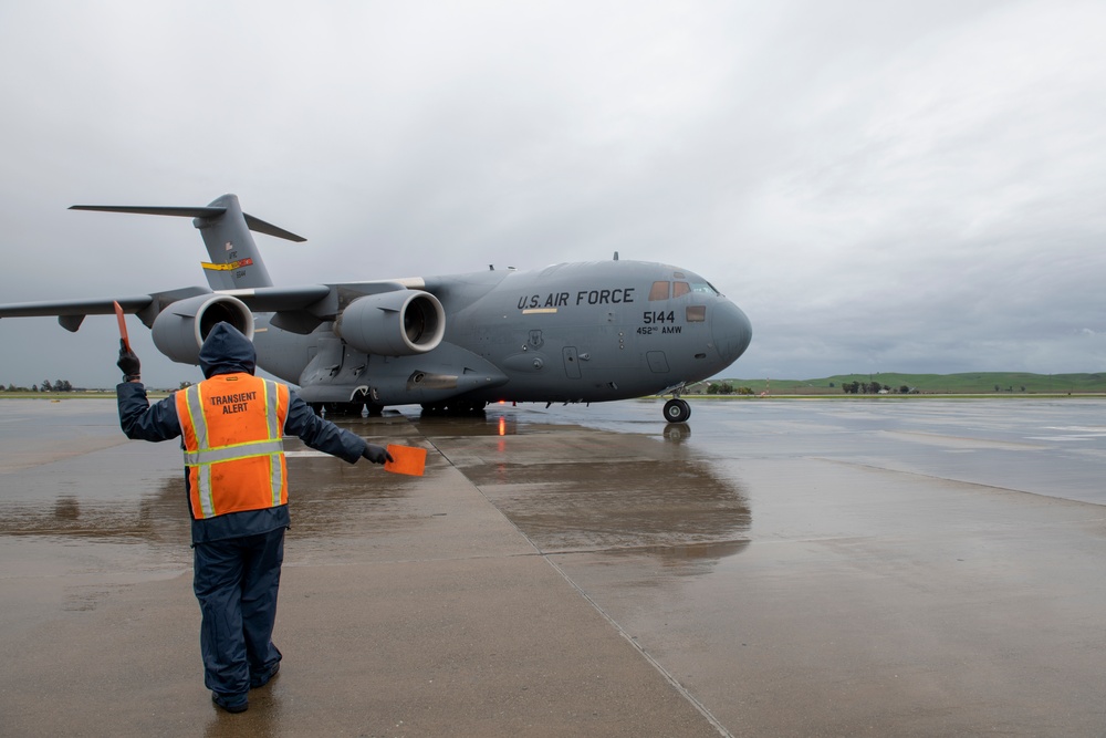 Mobility Airmen deliver aid to combat COVID-19