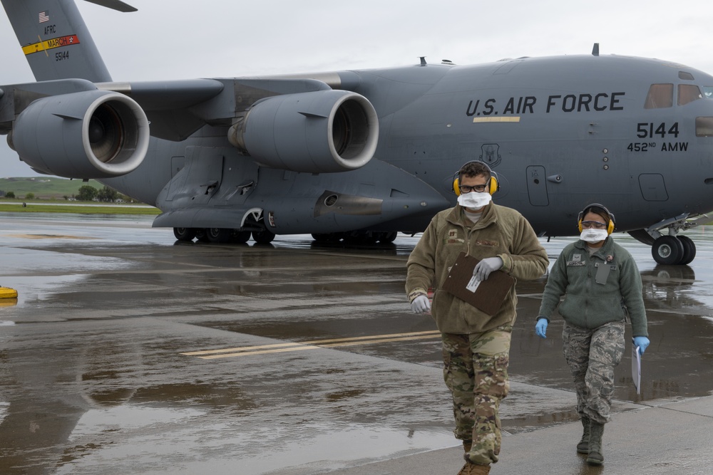 Mobility Airmen deliver aid to combat COVID-19