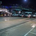 USS Theodore Roosevelt (CVN 71) move meals, ready to eat (MREs) for Sailors