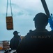 31st MEU Marines, USS America Sailors conduct supply onload at White Beach