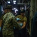 31st MEU Marines, USS America Sailors conduct supply onload at White Beach