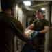 31st MEU Marines, USS America Sailors supply onload at White Beach