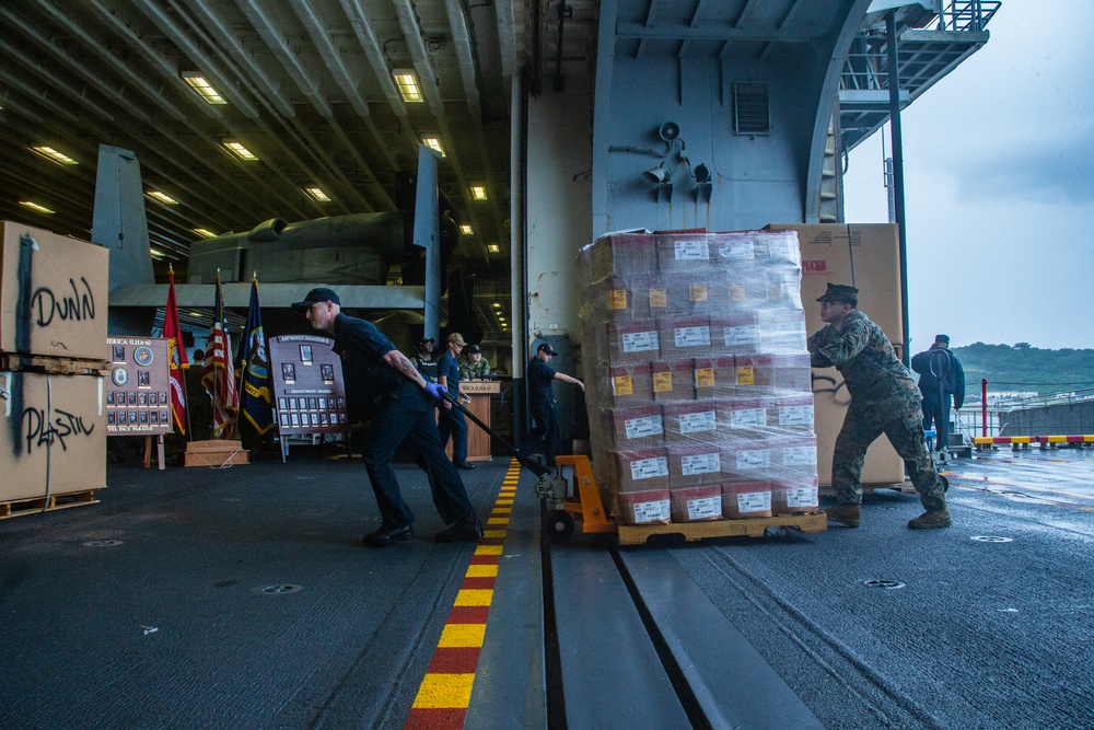 31st MEU Marines, USS America Sailors conduct supply onload at White Beach