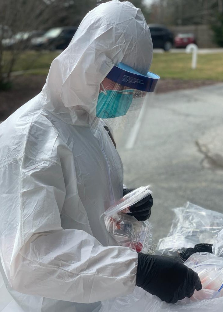104th Medical Group professionals administering COVID-19 tests in community